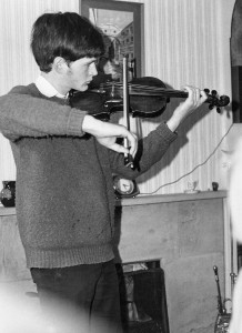 Hugh Burton, a family friend, playing violin in dad's house in 1977ish