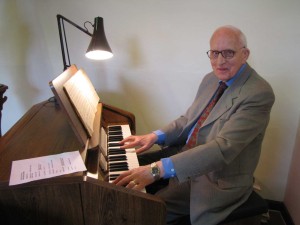 John in his element, at the organ, Knapton Methodist Church, Easter Sunday 2010