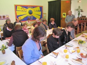 Peter Gotts leads prayer at breakfast on Easter Sunday in 2010 at Knapton Methodist Church