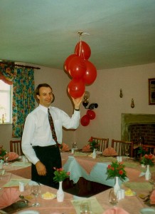 David sorts out the festive balloons at mum and dad's Ruby wedding anniversary, May 1993