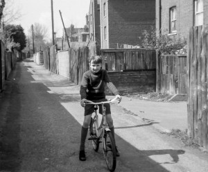 David riding his bike in the lane immediately behind our garden in Vicarage Road, Cromer