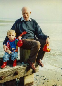 John plays a somewhat sheepish grandad to James, Cromer beach, 1995